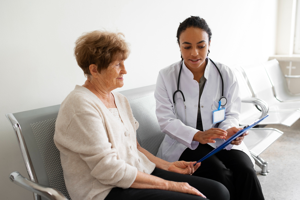 A doctor counseling her patient on the benefits and side effects associated with Medical Marijuana use.